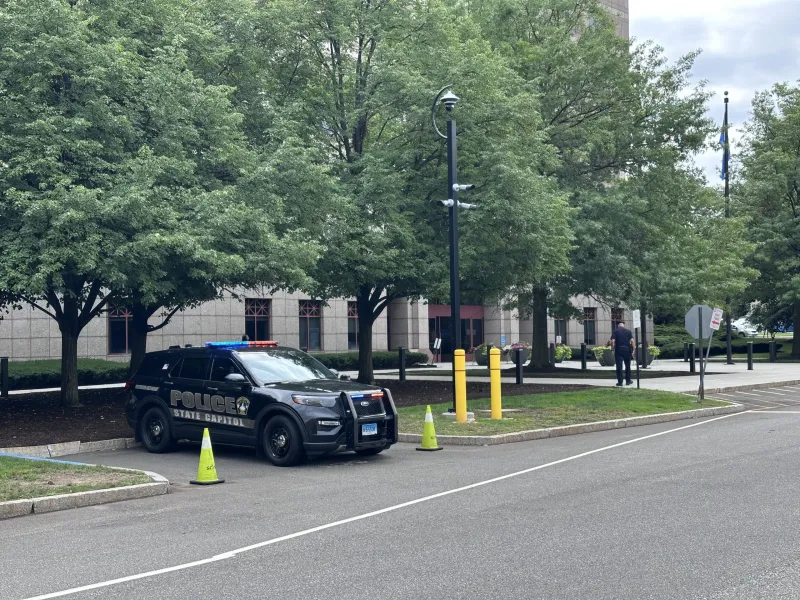Quickly closed window shields CT Capitol cop from knife attack