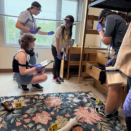 University of New Haven Alum Returns to Her First Dorm Room to Inspire Future Investigators