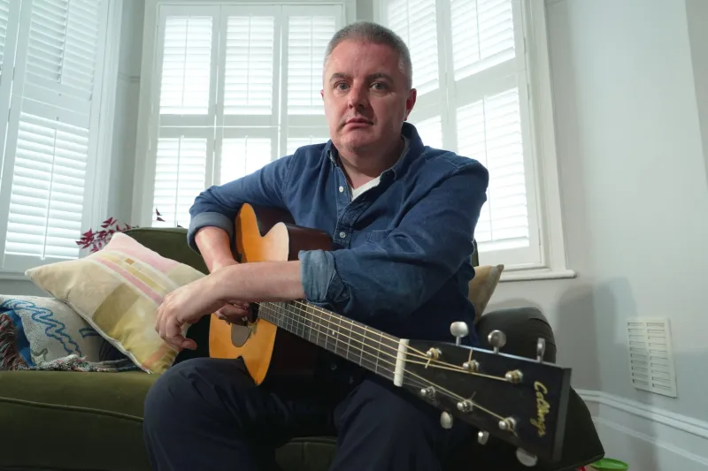 AI helped a musician with Parkinson's finish his new album when he could no longer play guitar