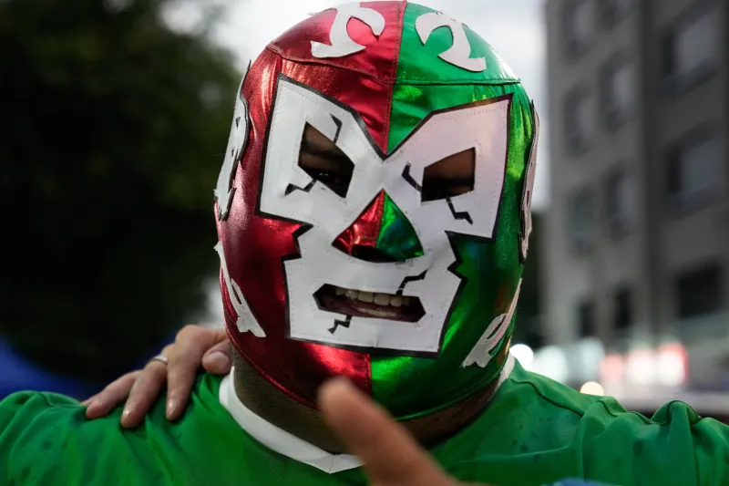 Masked wrestlers flood Mexico's World Cup streets as fans embrace lucha libre fever