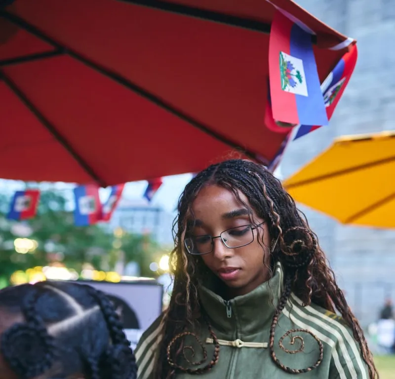 Braids, Beads & The Beautiful Game: Hair Artist Kayra Theodore Brings Culture To Brooklyn's World Cup Celebration