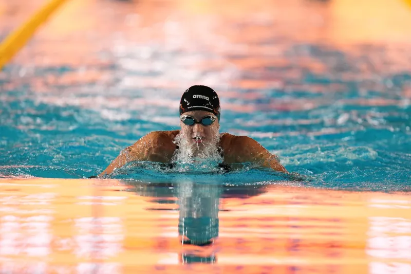 Kate Douglass blazes to 50 free world record in Pan Pacific prelims