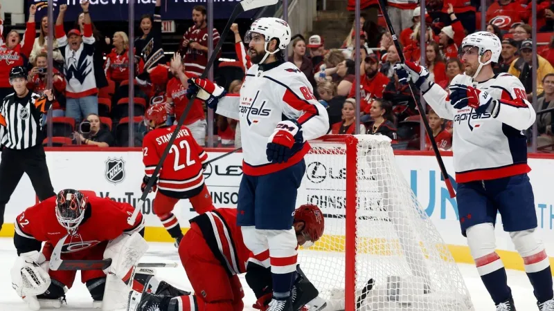 Tuch scores twice in his first game for Washington, helping the Caps beat the Hurricanes