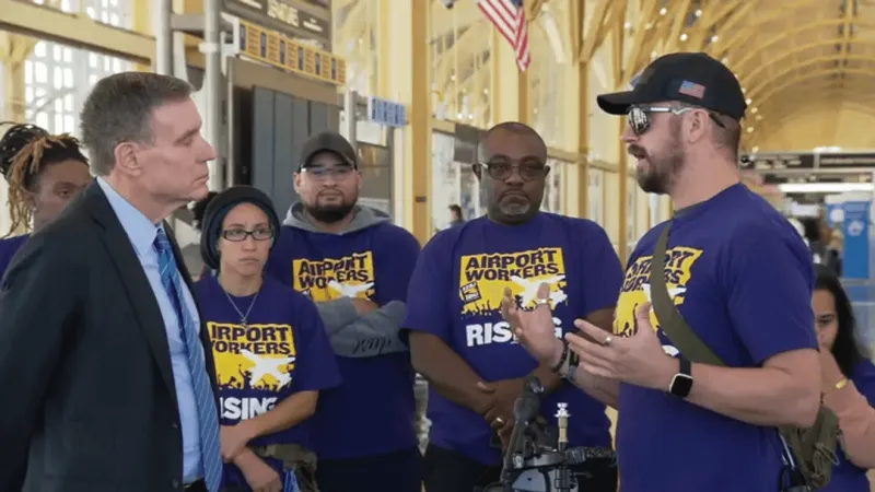 Virginia Sen. Warner backs airport workers' call for affordable health care