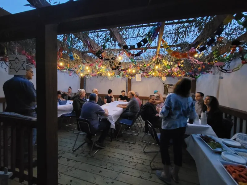 Adat Reyim Dines on Wine and Cheese in the Sukkah