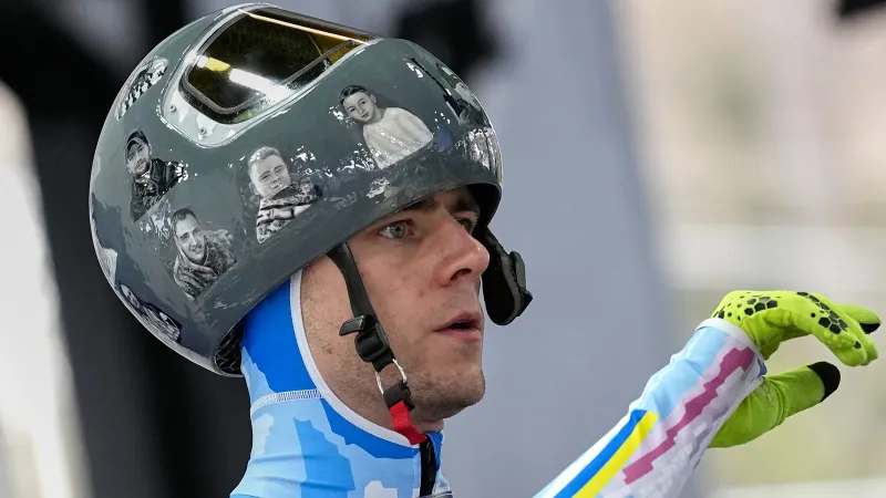 Ukrainian athlete out of Olympics over banned helmet honoring war dead