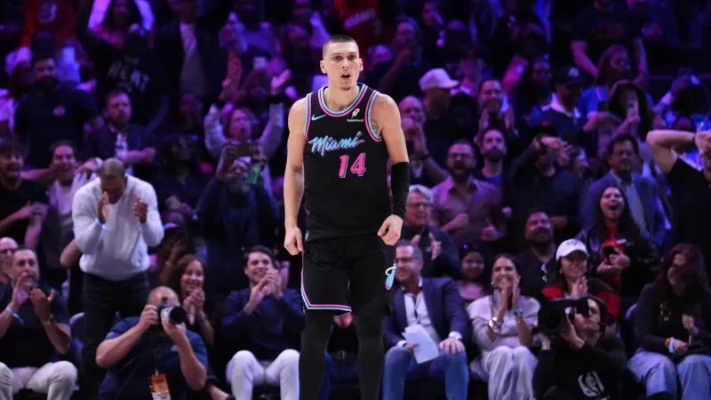 Heat rally late, use 14-0 run in final moments to pull away and bea...
