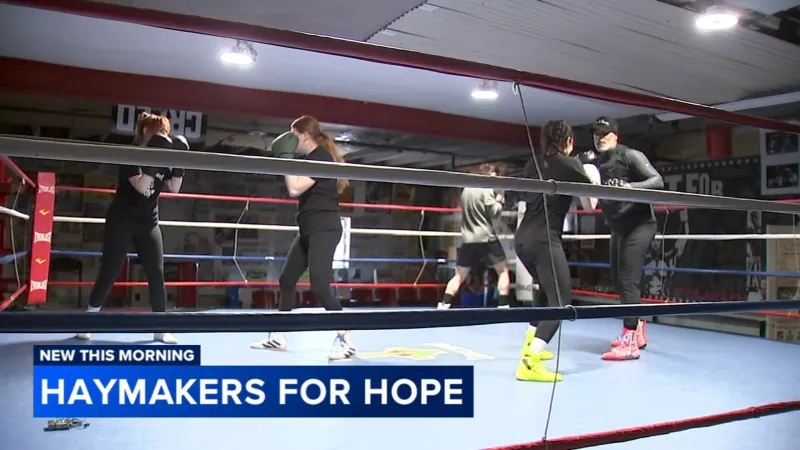 Amateur boxers prepare to enter the ring for the fight against cancer