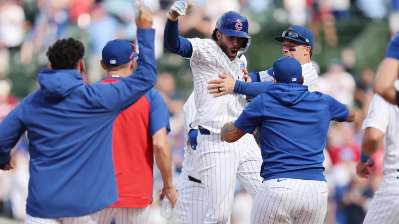 Swanson's hit in 10th gives Cubs 8-7 victory that extends both win ...