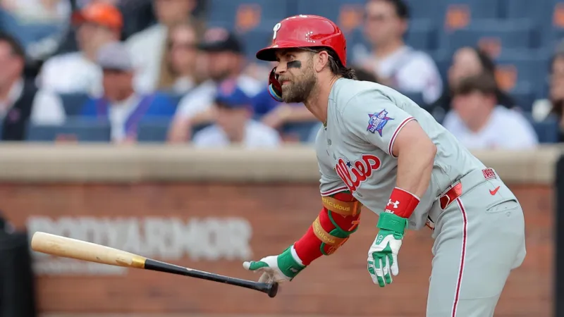 Hill makes incredible grab as Wheeler pitches Phillies to 2-1 win a...