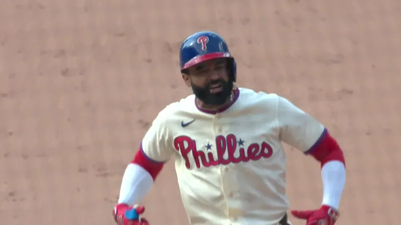 Schwarber hits 2 HRs, Hill delivers RBI single in 12th inning as Ph...