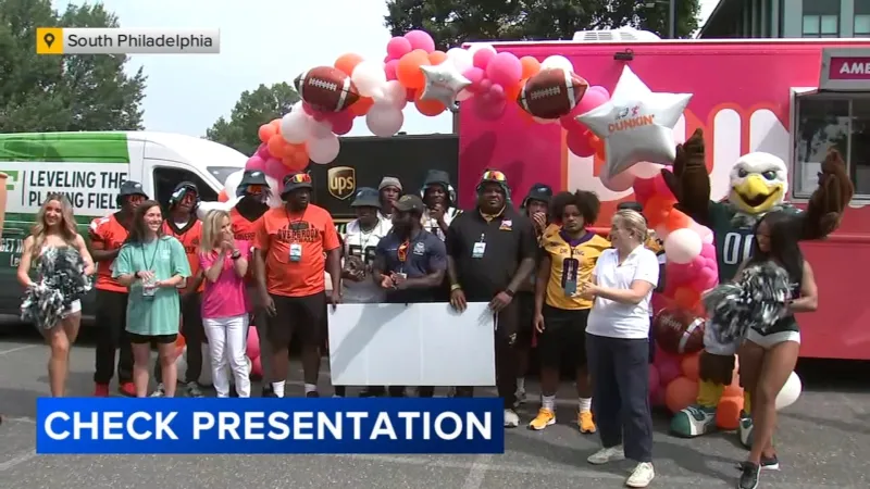 Dunkin' presents $25k check to support youth sports