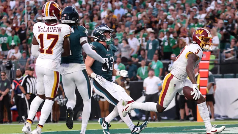 Jalen Hurts throws 3 TD passes and Eagles stuff Commanders" late 2-...