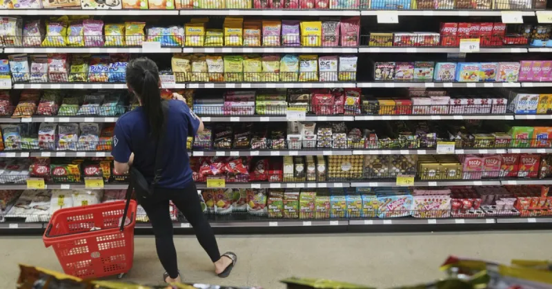 More American families are skipping meals or relying on food donations, new Fed survey finds
