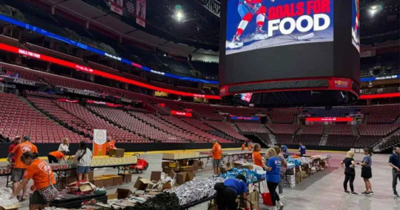 Florida Panthers and Florida Blue pack 500 food bags for South Florida families in need