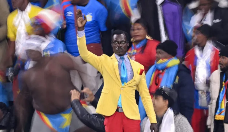 Why Does 'Lumumba Vea,' DR Congo's 'Statue Man,' Stand The Whole Match?