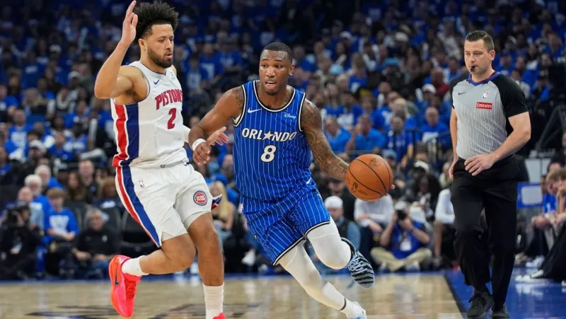 Magic pick up option on Cain's contract for 2026-27