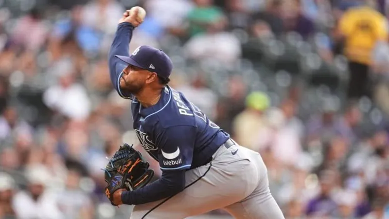 Peralta roughed up in debut but Rays rally to beat Rockies in 11 innings