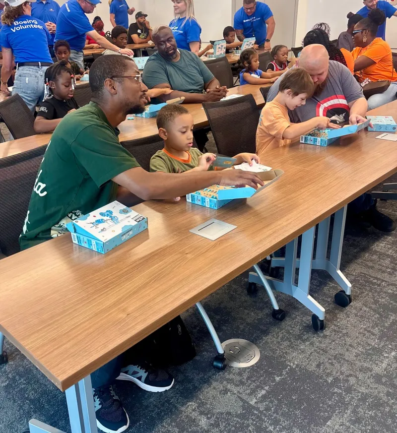 Boeing, Jumbo Shrimp host school supply giveaway
