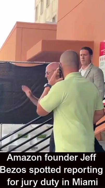 Amazon founder Jeff Bezos spotted reporting for jury duty in Miami (Video)