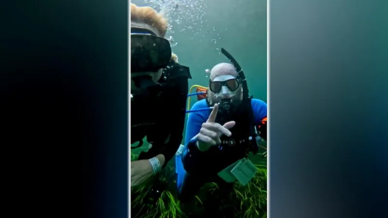 Deaf scuba diver makes history