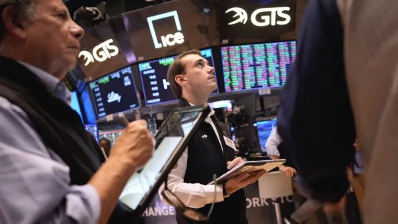 U.S. stocks jump after oil prices fall and pressure from the bond market eases