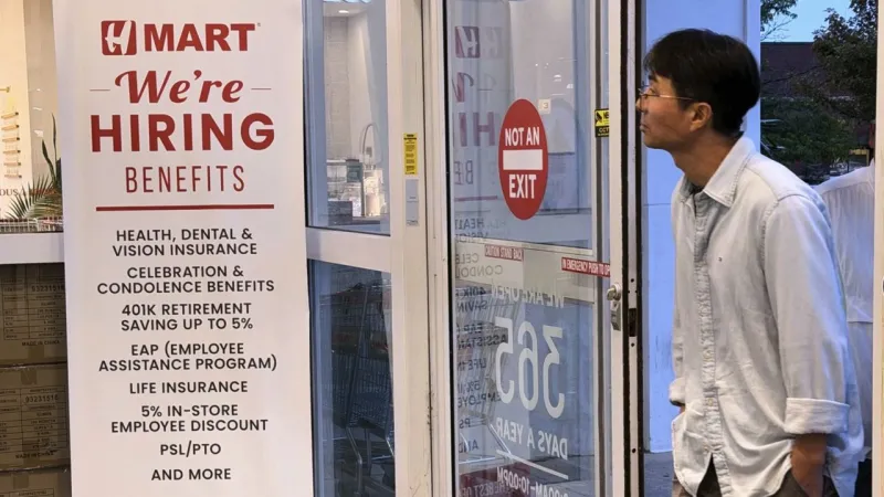 Claims for unemployment benefits drop to 197,000, the lowest since mid-July as layoffs remain rare