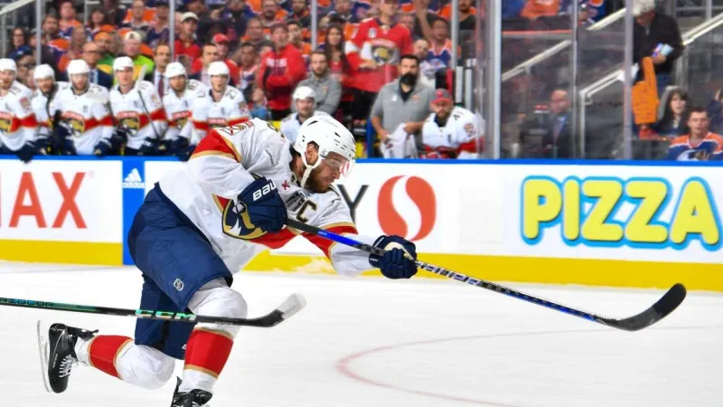 Luca Cagnoni scores in OT in the Sharks' season-opening victory over the Panthers