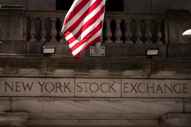 Wall Street retreats from its record as stocks fall worldwide