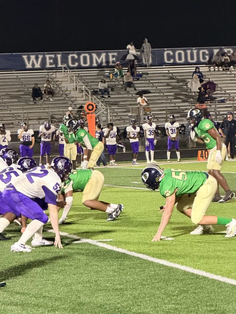 Cougars Cruise Past Spartans in 57-20 Victory