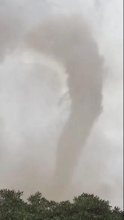 Eyewitness video shows funnel cloud moving thorough Italy's Sicily. (Video)