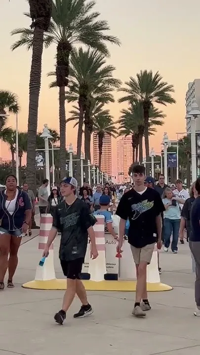 Golden sunset sky and Rays fans (Video)