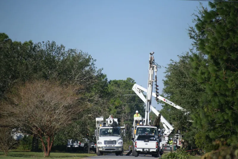 Linemen work to restore Navarre's power