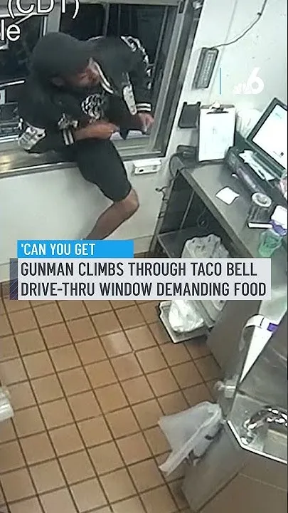 Gunman climbs through Taco Bell drive-thru window demanding food (Video)