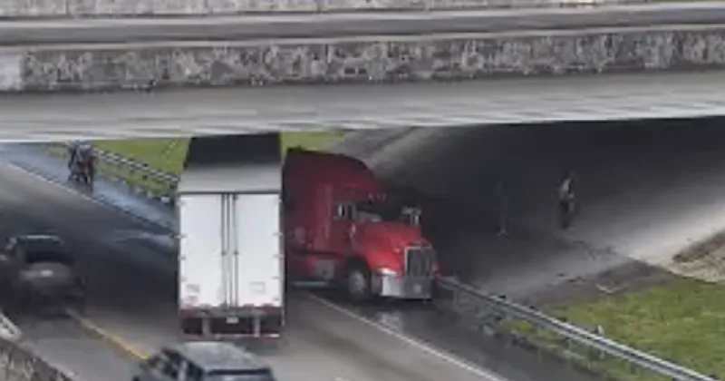 Jackknifed semi-truck blocks northbound lanes of Florida's Turnpike in Martin County