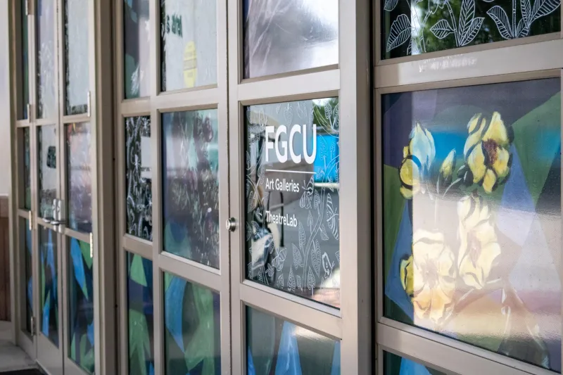 FGCU alumni artwork displayed in window installment created to increase bird safety