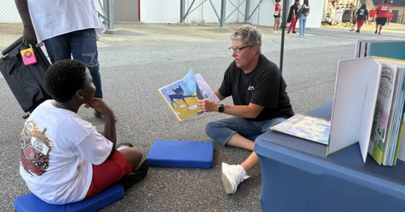 Friday night brights: Cairo library brings books to the stadium to boost youth literacy