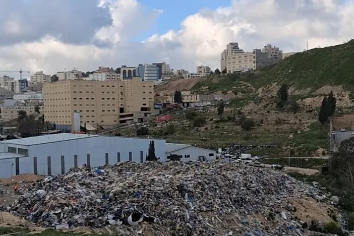 Palestinians use recycling as Israel's restrictions trigger a trash crisis