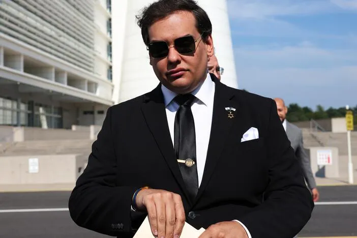 DOJ is investigating former congressman George Santos for insider trading on Kalshi