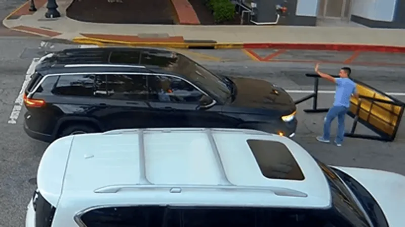 Video shows rooftop bar table striking Jeep during severe storm in downtown Macon