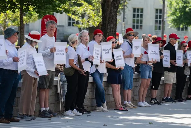 PHOTOS: 'Signs of Fascism' silent vigil