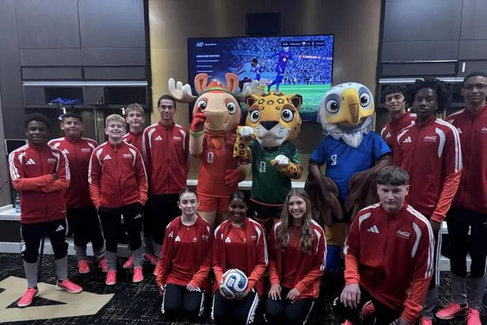 'It's really an honor' Teen flag bearers open first Atlanta world cup match