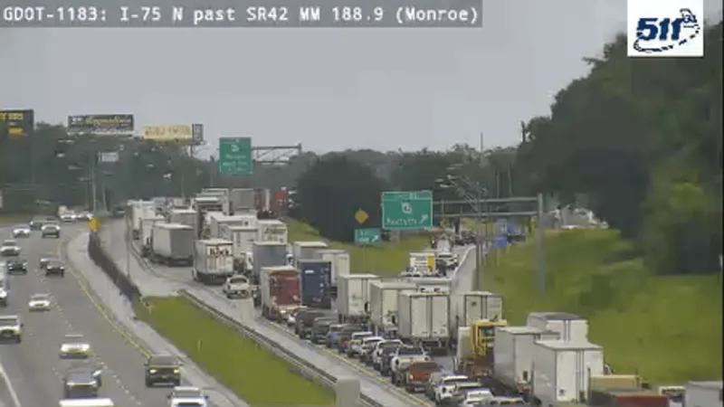 All lanes closed on I-75 South after 18-wheeler overturns in Monroe County