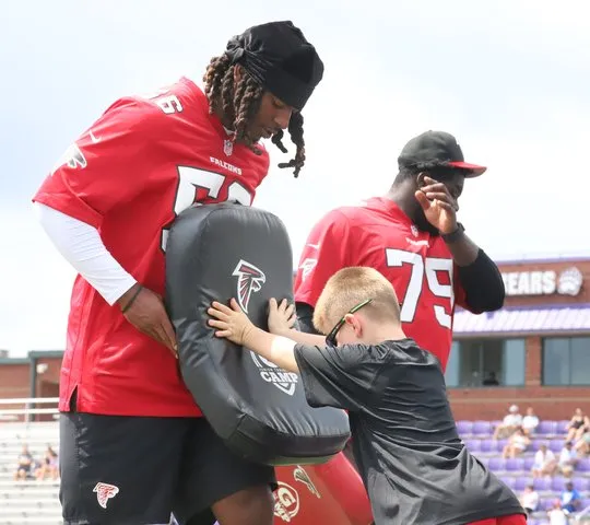PHOTO GALLERY: Atlanta Falcons rookies give back with youth camp at Cherokee Bluff High