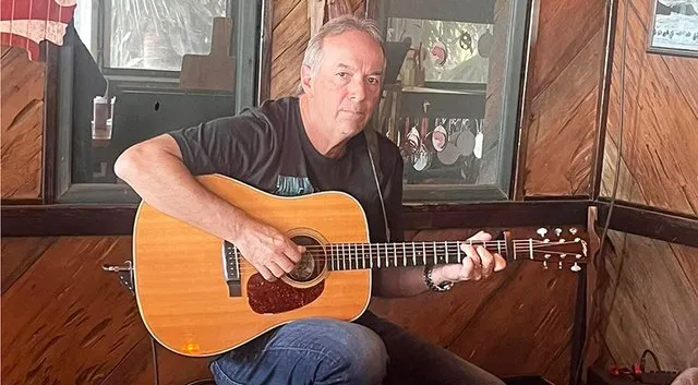 Claxton judge brings faith to courtroom, guitar to worship