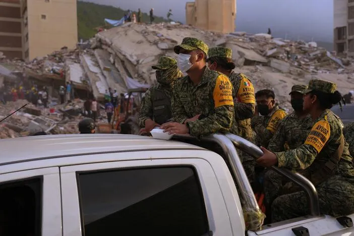 "If you are alive, make any noise": Venezuela searches rubble on day four