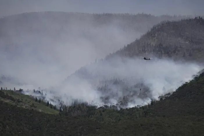 Three firefighters killed on Colorado-Utah border as wildfires intensify