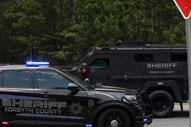 LOOK: Scenes from armed standoff in west Forsyth County