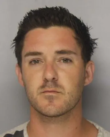 Flowery Branch man charged with $10K home burglary