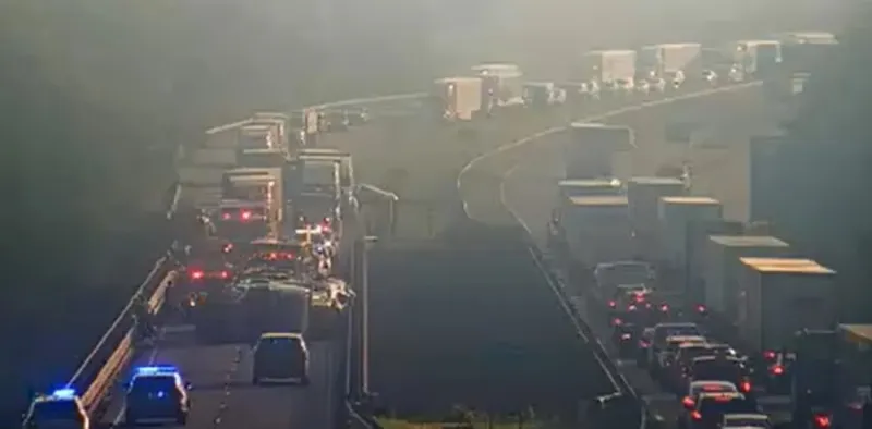 Car hauler overturns on I-85, closes state line bridge